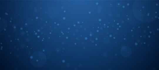 small light particles on a dark blue background