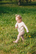 © Katrin_Primak - Little girl playing outdoors in nature, cheerful childhood moment