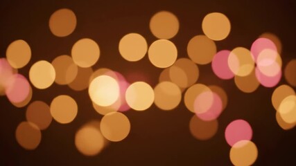 Wall Mural - A soft seamlessly looping video displays glowing bokeh light spheres drifting and blurring, creating a gentle and romantic abstract background with subtle motion animation, party, sparkle