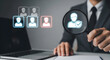 © mumtaz - Business Professional Using Magnifying Glass to Select Candidate Profiles for Recruitment and Hiring Process in Modern Office Environment