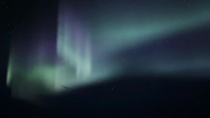 Wall Mural - A gentle soft glow aurora borealis effect slowly undulates and shifts across a dark, abstract sky in a seamlessly looping video nature, aurora borealis effect, loop