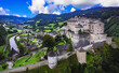 Austria tourism . greatest historic landmarks. impressive Hohenwerfen castle medieval fortress surrounded by Alps mountains. aerial drone view. Austrian market town of Werfen in the Salzach valley