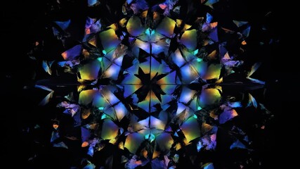 Wall Mural - A seamlessly looping video presents a multicolor swirling circular flare breaking into a beautiful abstract mosaic pattern concentric, modern, mystery