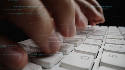 This image captures a close-up view of hands typing on a keyboard, overlaid with programming code, symbolizing the dynamic world of software development and innovation. Xenic