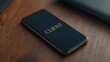 © FocusFusion - Client Phone on Wooden Desk During Office Hours