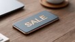 © FocusFusion - Sale Notification on Smartphone on Wooden Table