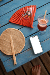 Summer still life with blank screen smartphone 