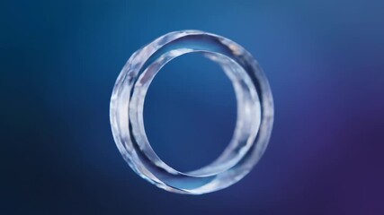 Wall Mural - A seamlessly looping video of a crystal energy ring slowly rotating and refracting light with a subtle shimmer beauty, crystal, visual