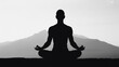 © Hanan - Silhouette meditation yoga pose in nature background for mindfulness and wellness practice relaxation