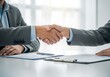 © nilo - Business Deal Handshake Agreement.