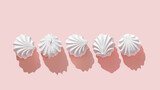 Set of white marshmallow meringues. Zefir dessert on pastel background. Top view five diffrent objects, rose color zephyr, minimal design sweet dessert, gentle colors and romance festive food