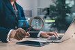 © JD8 - Businessman analyzing AI agents with magnifying glass and laptop. Artificial intelligence for chatbots, automation, data analytics and digital transformation in business solutions. AI agents
