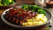 © Rho - Deliciously glazed ribs with creamy mashed potatoes and broccoli