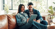 © peopleimages.com - Couple, smile and tablet with research in new home for online shopping, renovation and boxes. Excited, man and woman with technology on sofa for relocation, decor app or moving in house together