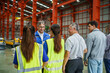 © DG PhotoStock - Morning briefing and meeting of workers and engineers in factory.