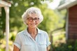 © nsit0108 - Portrait of a cheerful senior woman smiling and enjoying her retirement in the countryside