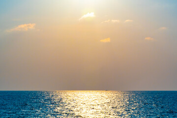Wall Mural - Aerial view Beautiful view sunset over sea surface beautiful wave Amazing light sunset or sunrise sky over sea beach with wave crashing in the ocean.nature background