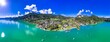 Austria tourism and most scenic places. wonderful turquoise lake Wofgangsee and beautiful village Sankt Gilgen surrounded by alps mountains Aerial panorama. Austrian travel in Salzkammergut