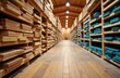 © starush - Wooden shelves stocked with planks and boards in a hardware store aisle