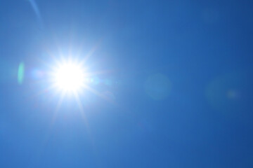 Wall Mural - bright sun on clear blue sky. good weather