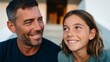 © Z A C - Father and daughter enjoying a beach sunset.