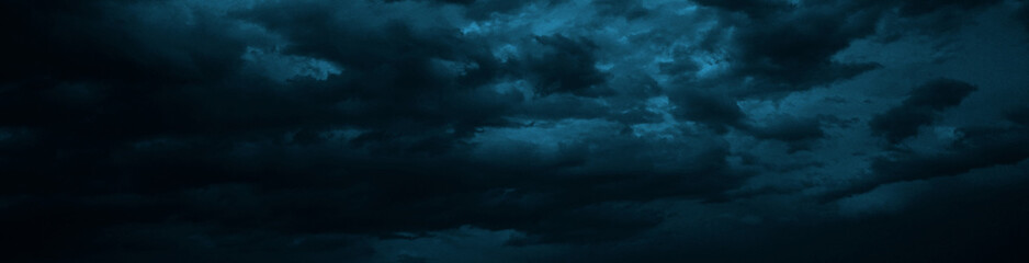 Wall Mural - dramatic sky with heavy clouds. black dark blue green grey night cloudy sky. thunderstorm storm rain