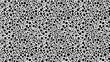 © Visual Graphics - Seamless black and white polka dot pattern background for textile and design projects