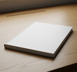 © JPhotography - Mock-up d'une couverture d'un livre vierge sur un bureau