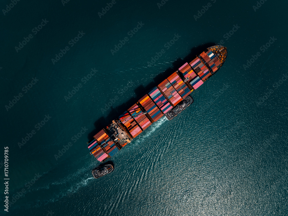 photograph of large container ship sailing on a deep sea, fully loaded ...