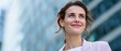 © HanThar Fusion - Confident professional woman smiling urban business district portrait photography bright environment upbeat perspective optimistic outlook