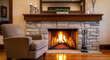 © MrLynx - Chair placed beside large stone fireplace with burning fire in living room