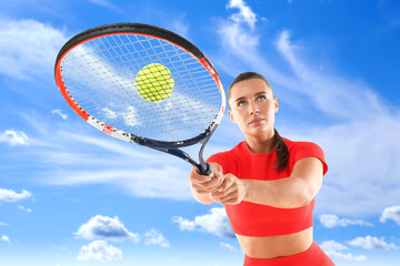 Wall Mural - woman playing tennis against blue sky with clouds, low angle view