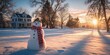 © abraham - A cheerful snowman stands in a snowy landscape at sunrise.