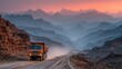© Jennifer - Truck drives on dirt road mountains in background colorful sky at dusk.