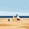 © Adobe - Boy builds a sandcastle on a flat beach with blue ocean, light blue sky and flying seagulls