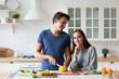 © BestForYou - Young man and woman are jointly preparing wholesome vegetable-based meals in the kitchen, enjoying quality time together and focusing on balanced eating