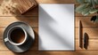 © SaroStock - Morning coffee and blank white page on a wooden desk, bathed in sunlight, ready for ideas and planning