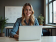 © Pal - Businesswoman working on laptop