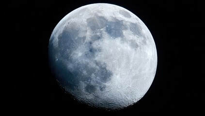 Wall Mural - A detailed close-up view of the moon's textured surface against a dark backdrop.
