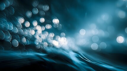 An abstract dynamic visualization of flowing blue energy trails and bright bokeh lights against a dark ethereal background suggesting technology or science