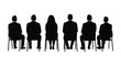 © MosaAmena - A row of silhouetted figures seated in chairs facing forward