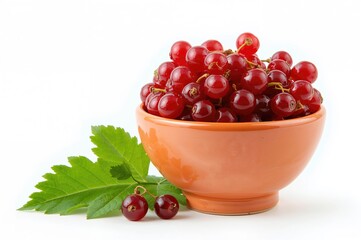 Wall Mural - Handcrafted colorful ceramic bowl filled with red currant berries against a white backdrop