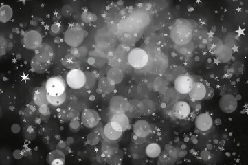 Wall Mural - Soft white and gray bokeh lights creating a blurred background with sparkling stars for festive decoration. Design overlay element.