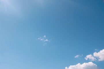 Wall Mural - a photograph capturing a clear azure sky