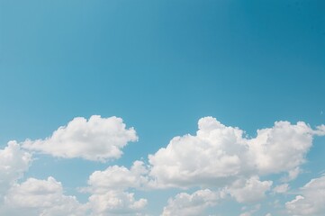 Wall Mural - Gorgeous azure sky dotted with fluffy white clouds