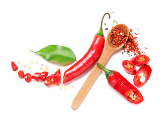 Wall Mural - Fresh cut chili peppers and flakes on white background. Top view