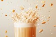 © Espresso - A glass of creamy oat beverage splashes as oats and almond pieces explode around it, capturing a vibrant, energetic moment.