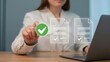 © Creative mind - Businesswoman's hand confirming document on laptop.