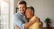 © HD COLLECTION - A young man warmly embraces his smiling father, sharing a moment of love and connection.