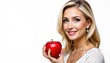 © MakeitEasy - A woman holding an apple. She is in focus, while the background is blurred to draw attention to her. Her expression seems pleasant as she holds the fruit up to the viewer.